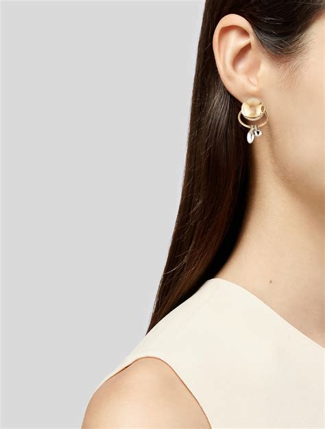 dior dangling earrings|christian mise en Dior earrings.